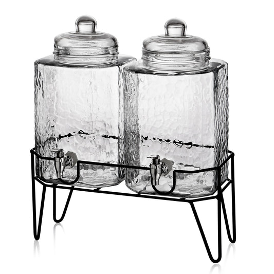 Two square textured glass beverage dispensers with silver spigots on a black metal wire stand.