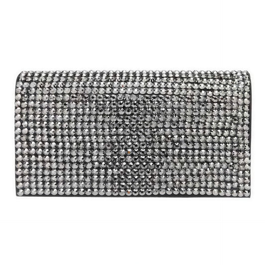 Silver clutch bag with rhinestone embellishments on a white background