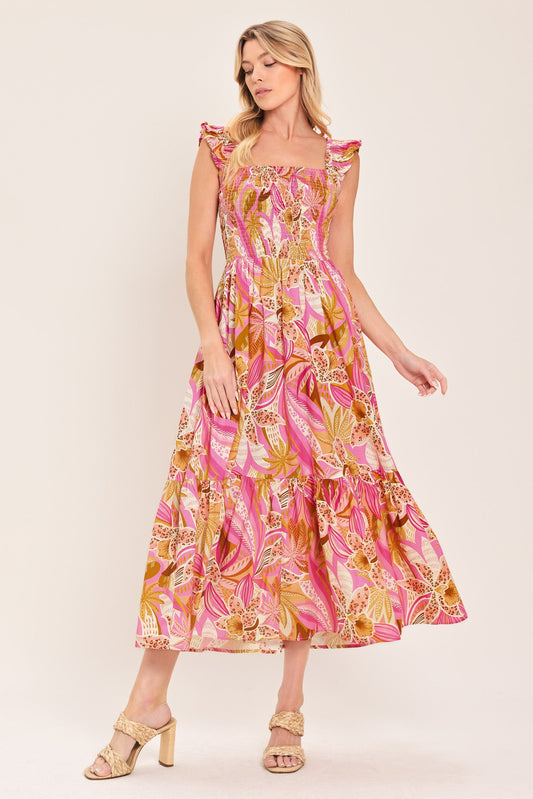 Pink and tan floral print woven midi dress with a smocked bodice, ruffled straps, and tiered skirt on a model.