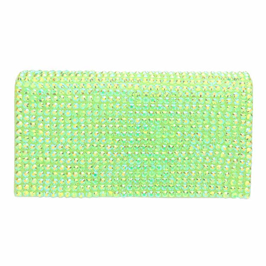 Green clutch bag with a textured pattern on a white background