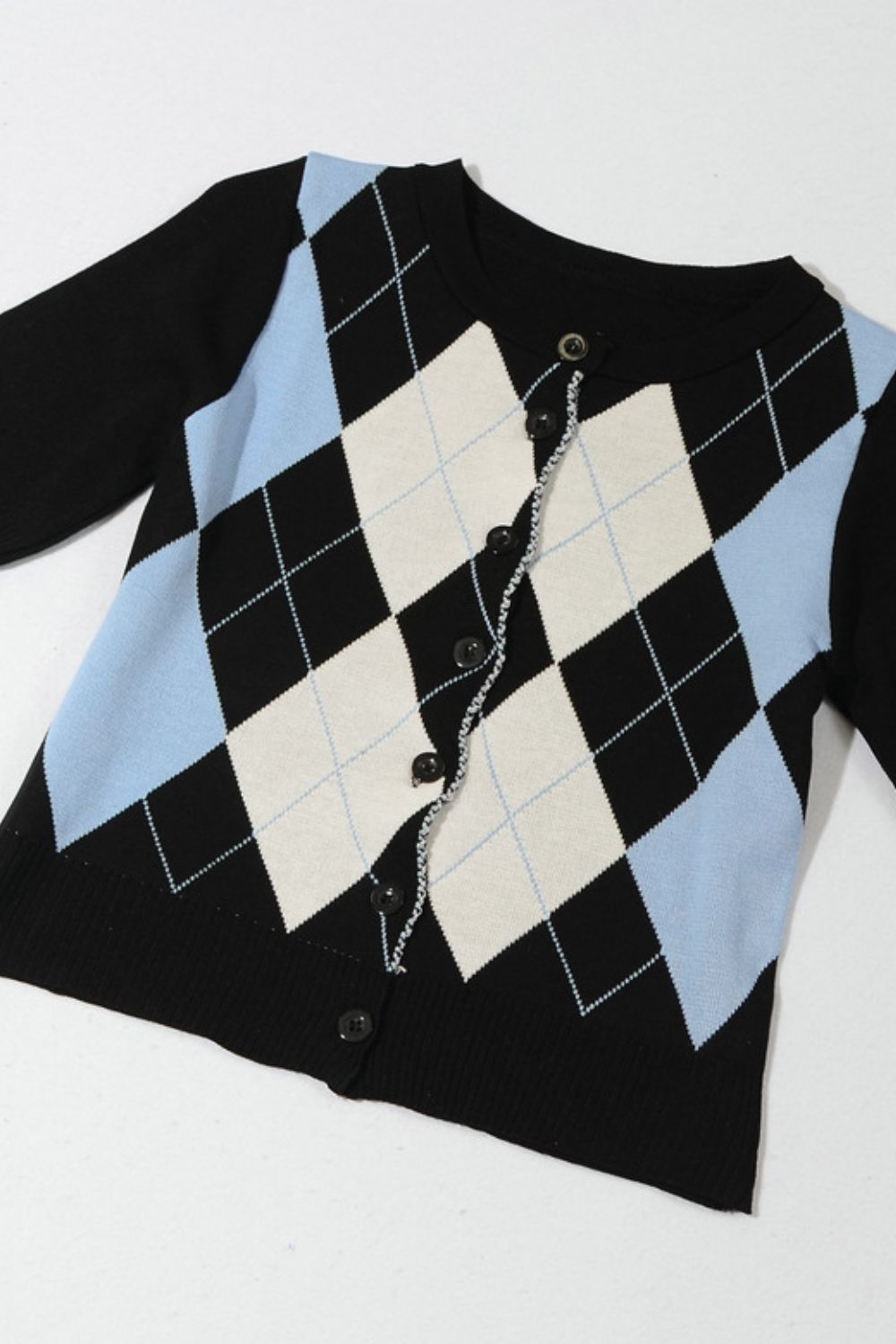 Argyle cardigan with ribbed collar styled for a casual preppy outfit