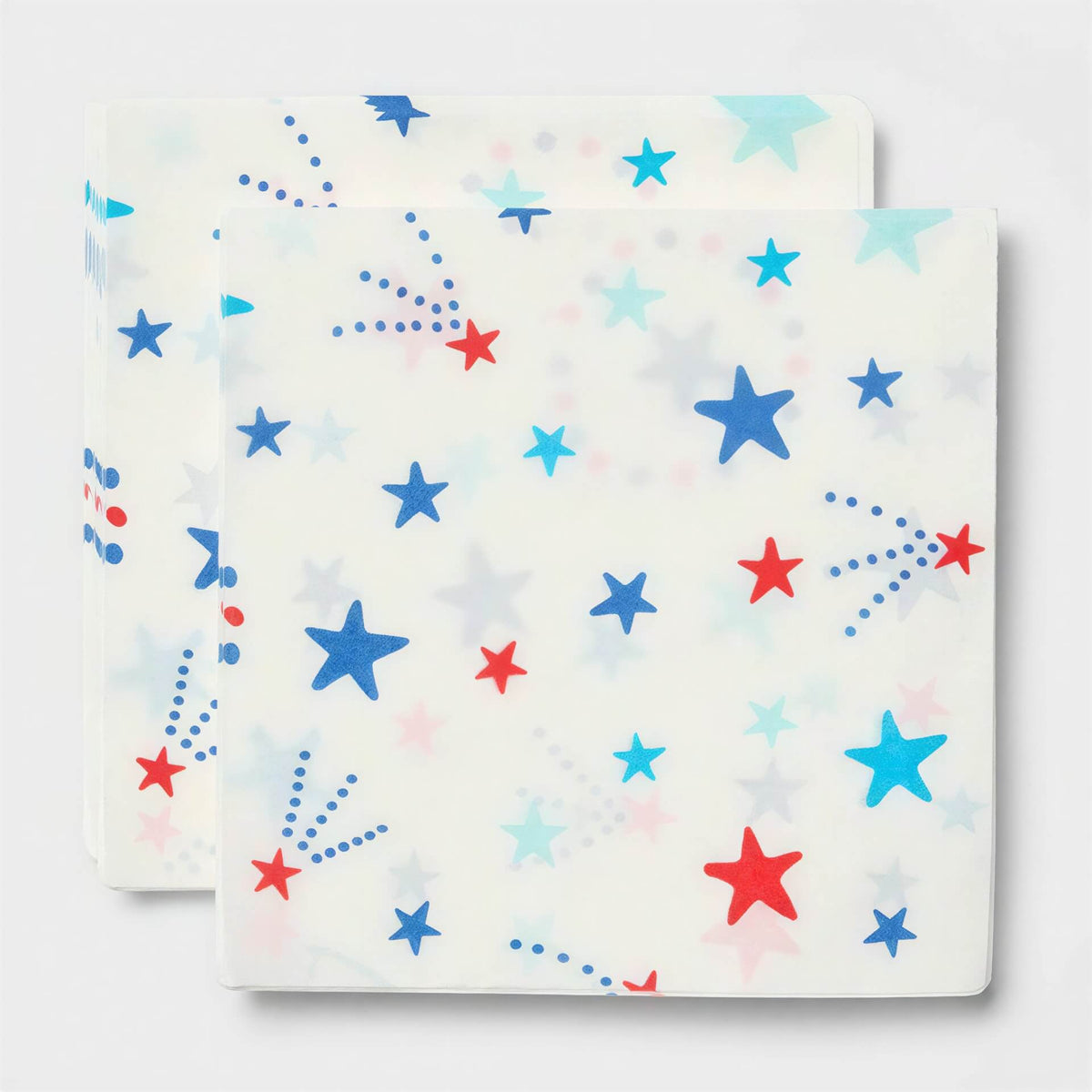 Two sheets of paper with star patterns on a white background