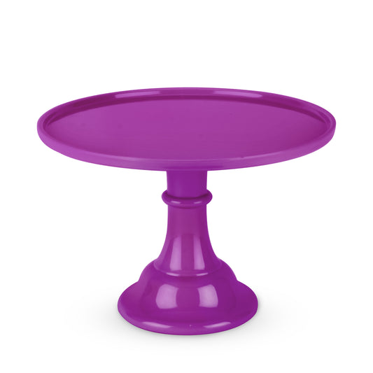 Purple cake stand on a white background