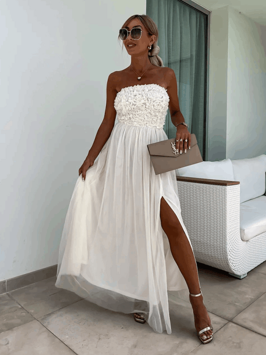 Elegant summer maxi dress with floral bodice and thigh-high slit for chic warm-weather style