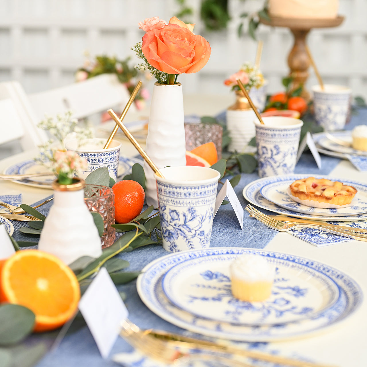 Table setting featuring french toile paper cup