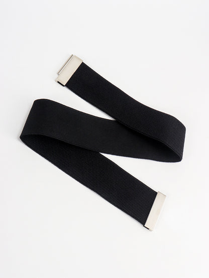 Black belt with silver buckle on a white background
