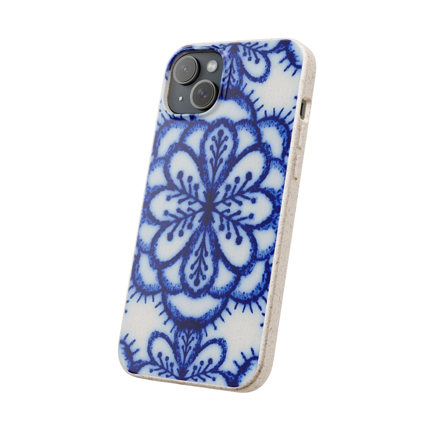 A phone case featuring a blue and white floral mandala pattern on a textured off-white background, with a light beige wooden edge, shown on a plain white background.