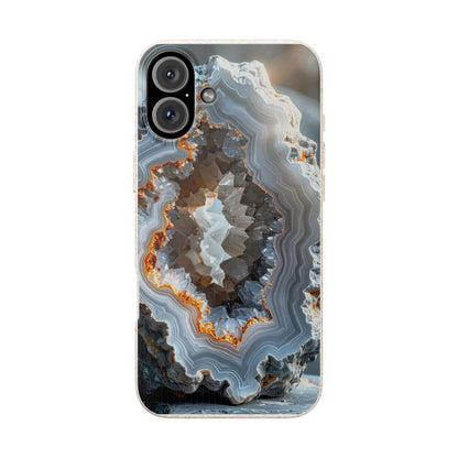 A phone case featuring a detailed geode and agate pattern with concentric bands of gray, white, brown, and orange, shown on a light gray background.