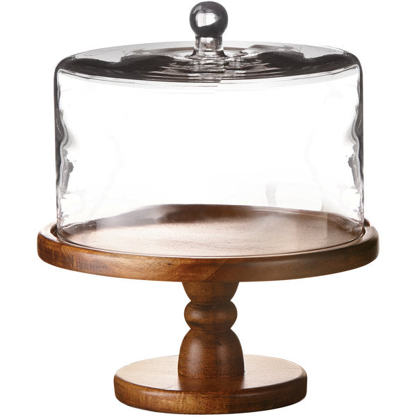 Wooden cake stand with a glass dome on a white background