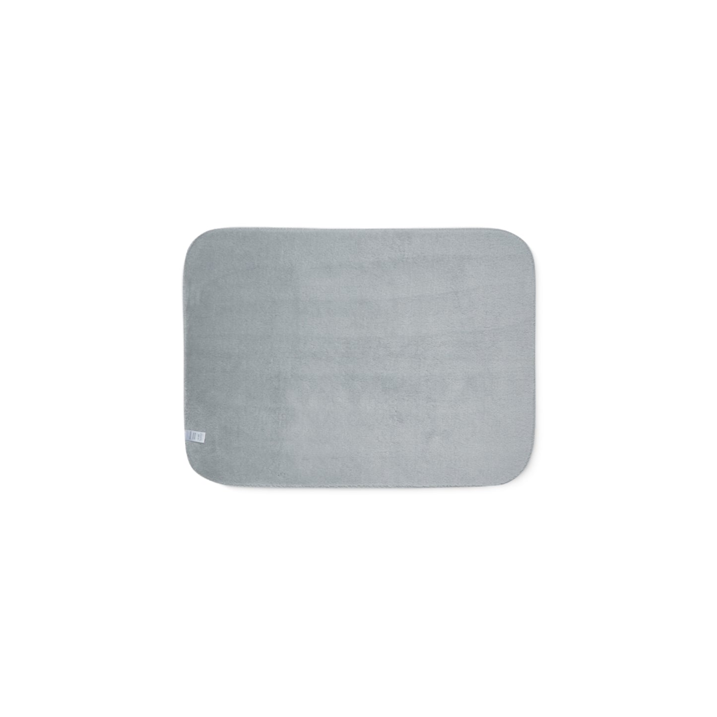 A rectangular gray bath mat with rounded corners, shown flat against a solid white background.