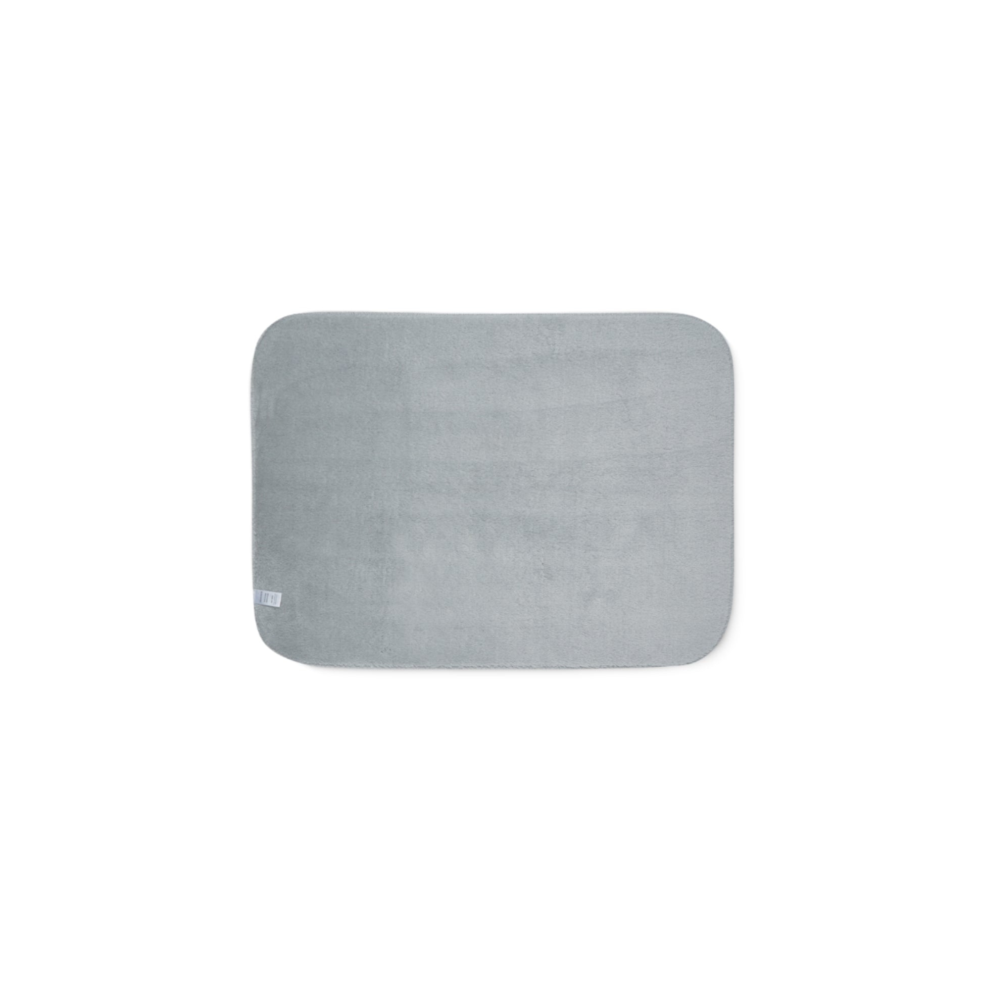 A rectangular gray bath mat with rounded corners, shown flat against a solid white background.