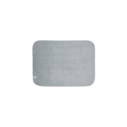 A rectangular gray bath mat with rounded corners, shown flat against a solid white background.