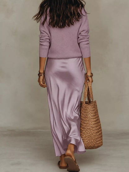 Back view of purple ribbed top and satin midi skirt set.