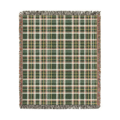 A square woven throw blanket with a green, white, and orange plaid pattern and fringed edges, shown flat against a white background.