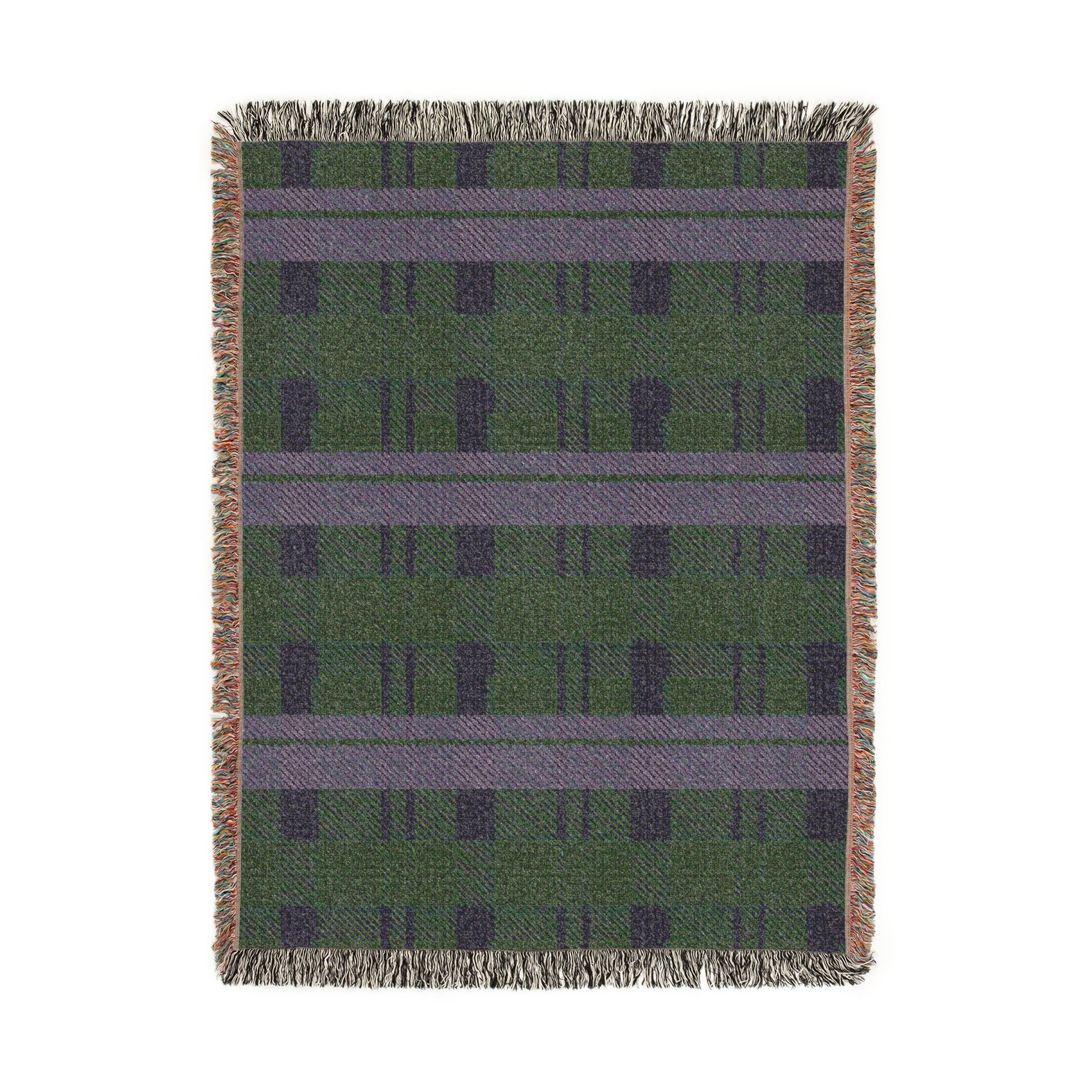 A rectangular woven throw blanket with a green and purple plaid pattern and fringed edges, shown flat against a white background.