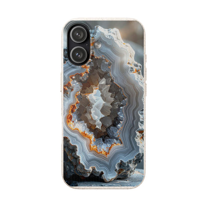 A phone case featuring a detailed geode or agate stone pattern with concentric bands of gray, white, brown, and orange, shown on a plain white background.
