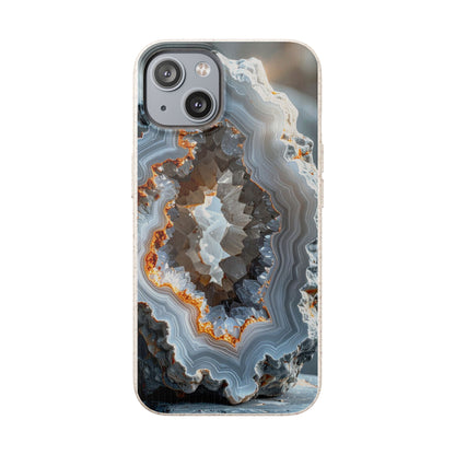 A clear iPhone case featuring a detailed geode or agate slice print with concentric bands of gray, white, brown, and orange, shown on a white phone against a plain white background.