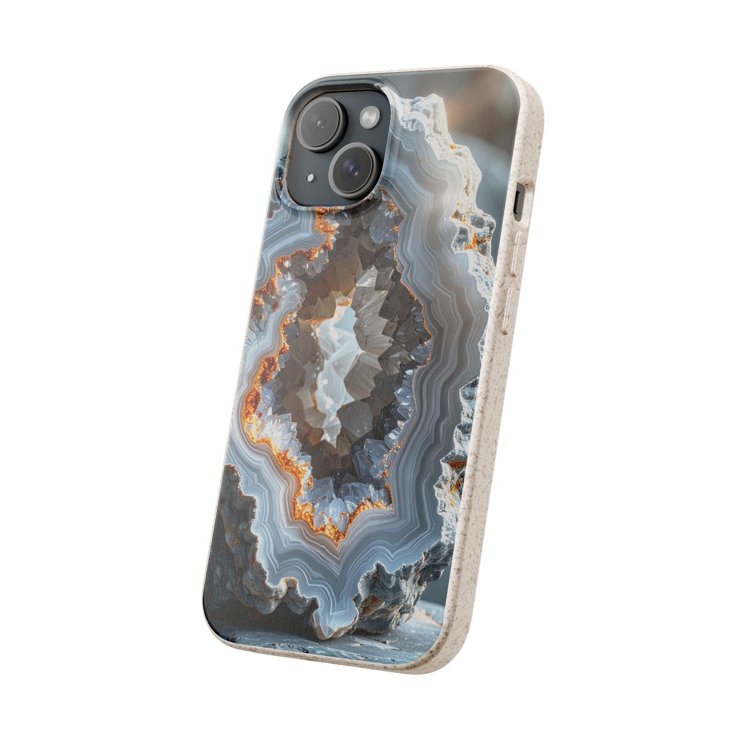 A phone case featuring a realistic geode or agate stone pattern with concentric bands of gray, white, black, and orange, shown on a light wood-textured frame against a plain white background.
