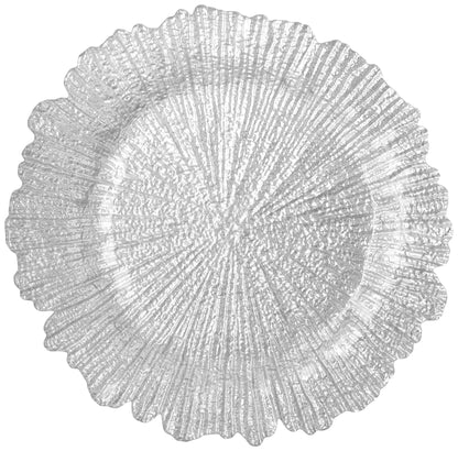 Round, textured silver placemat on a white background