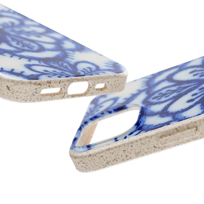 Two phone cases with a blue and white floral pattern and a textured beige base, shown on a plain white background.