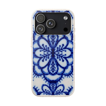 A protective phone case featuring a blue and white floral mandala pattern, shown on a plain white background.