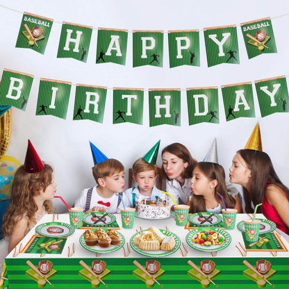 Children and adults at a birthday party with a 'Happy Birthday' banner and sports-themed table setting.