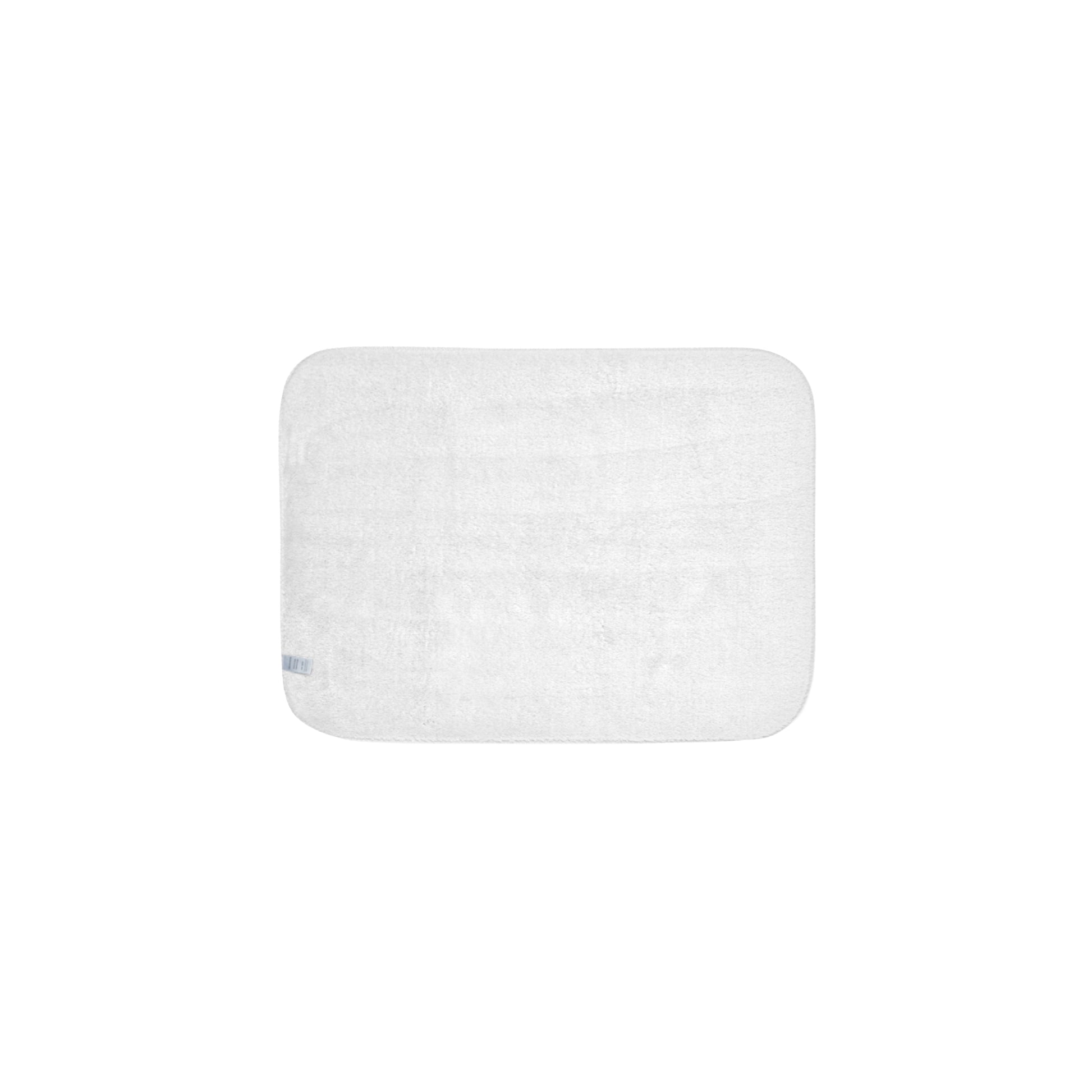 Rectangular white bath mat on a white background