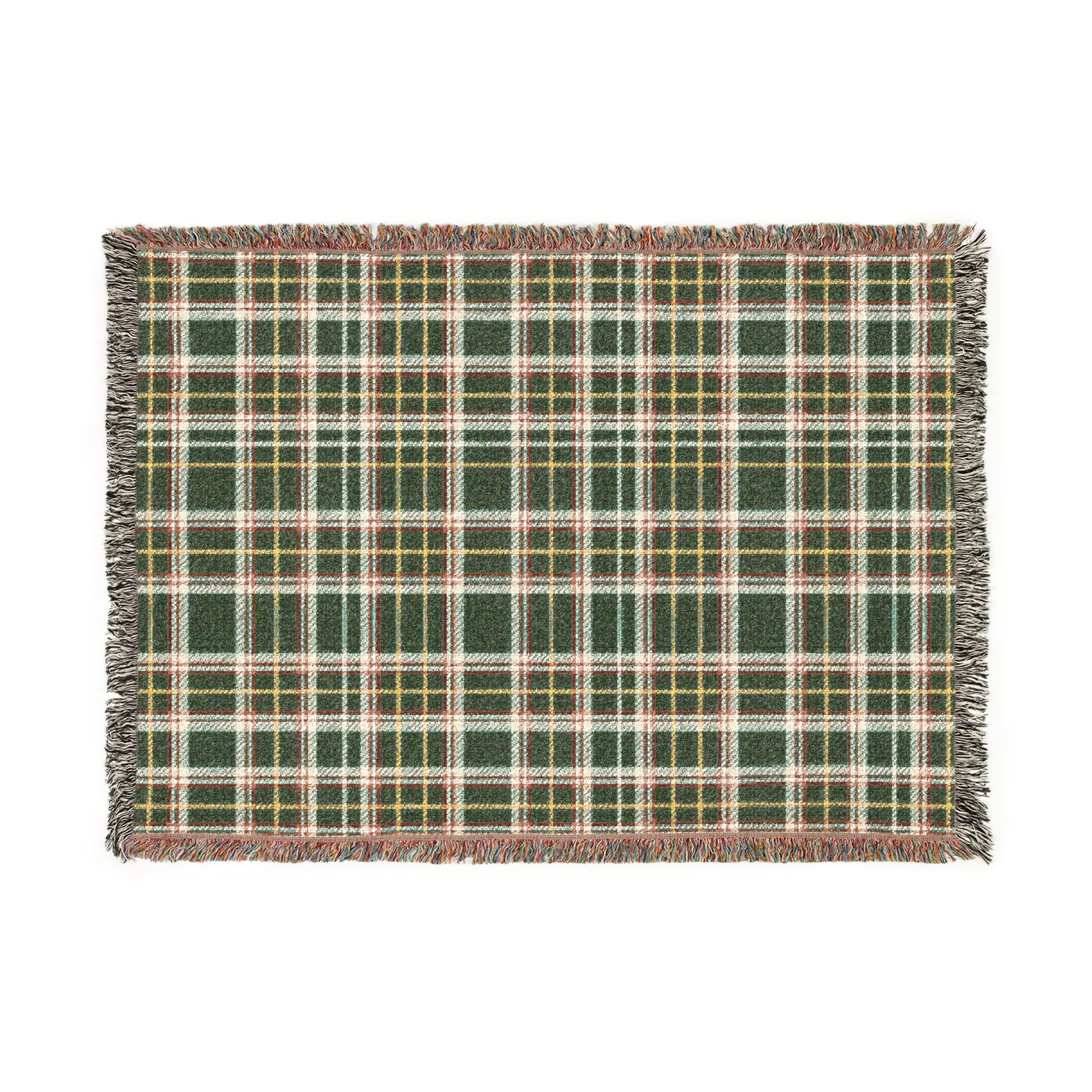 A rectangular woven placemat with a green, white, and yellow plaid pattern and fringed edges, shown flat against a white background.