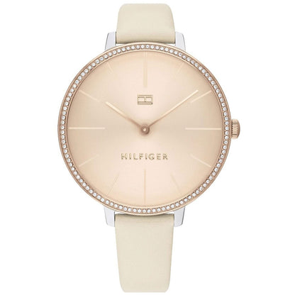 Tommy Hilfiger women's Kelly watch with a rose gold-tone case, beige dial, and cream leather strap.