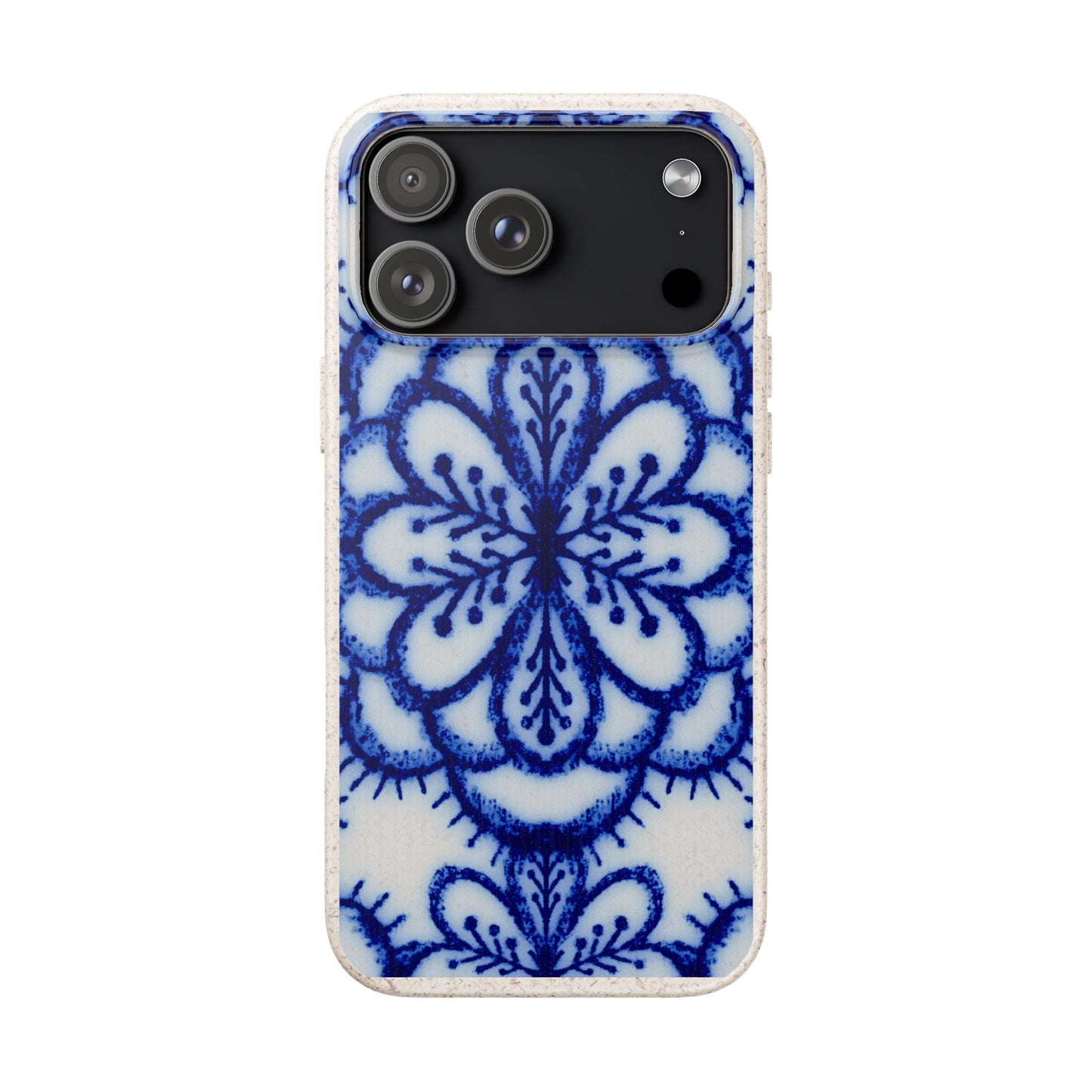 A protective phone case featuring a blue and white floral mandala pattern on a textured white background, shown on a plain white studio background.