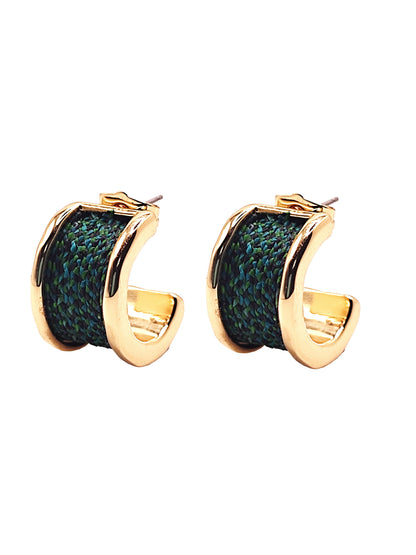 Pair of gold hoop earrings with green fabric interior on a white background