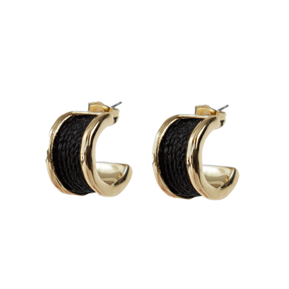 Gold hoop earrings with black interior on a white background