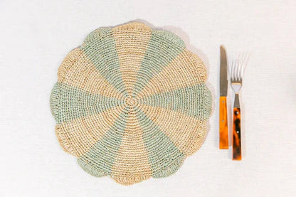 Pinwheel blue placemat with a scalloped edge, featuring alternating light blue and natural raffia colors.