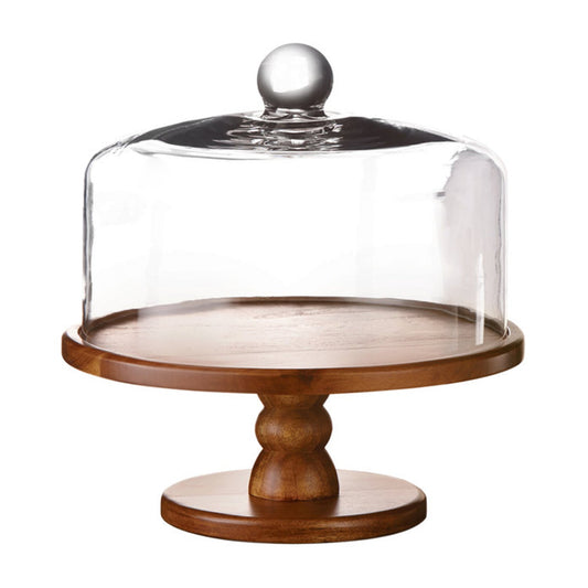 Round glass dome with a ball handle resting on a brown wood pedestal cake stand.