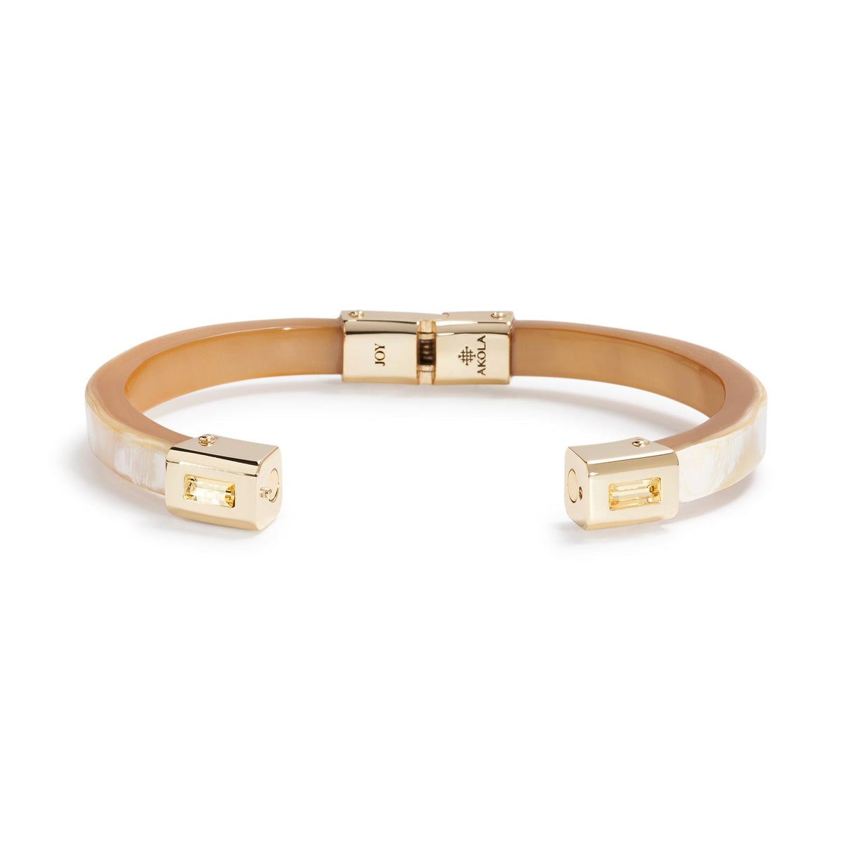 Gold bracelet with a white interior on a white background