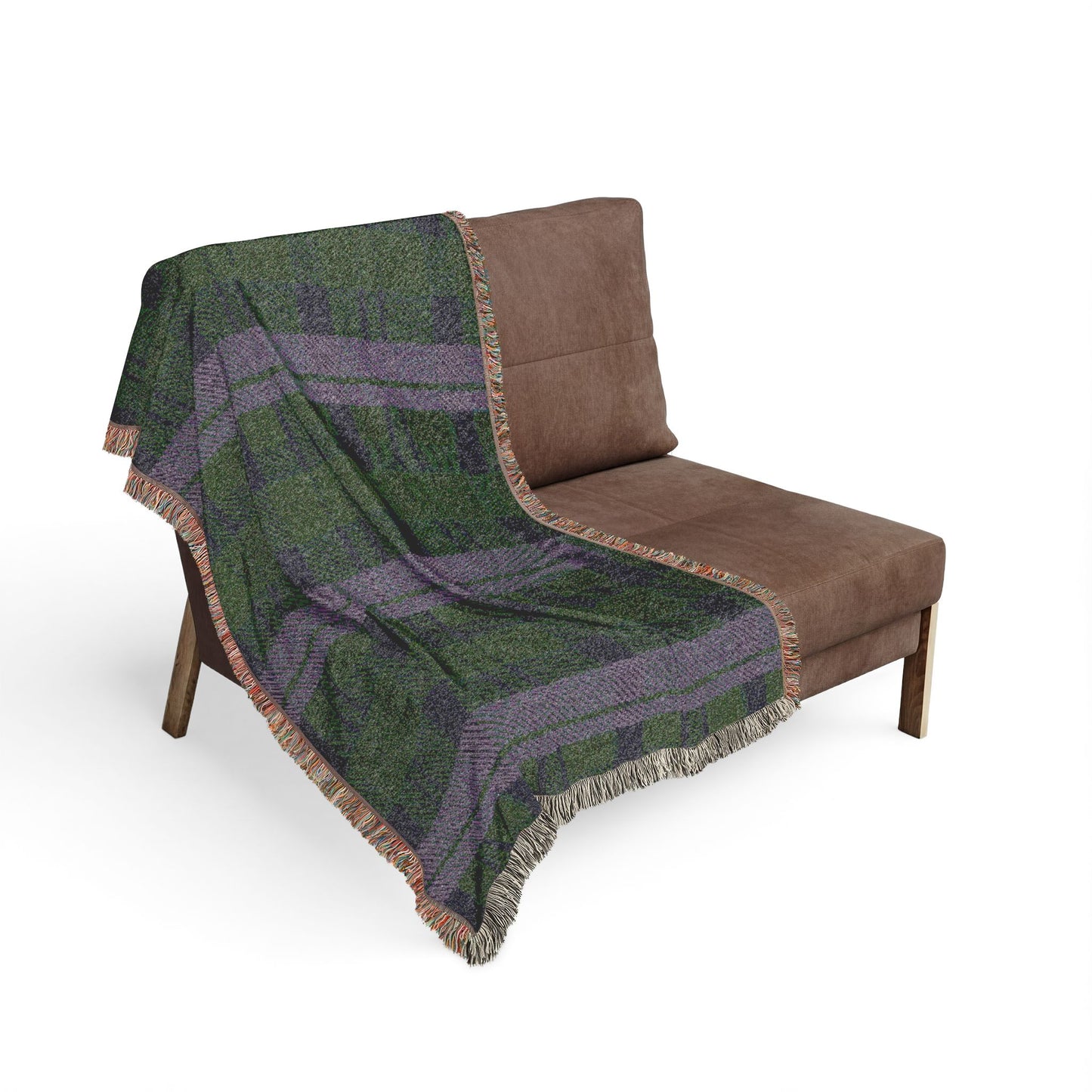 Decorative tapestry with intricate patterns draped over a brown chair on a white background