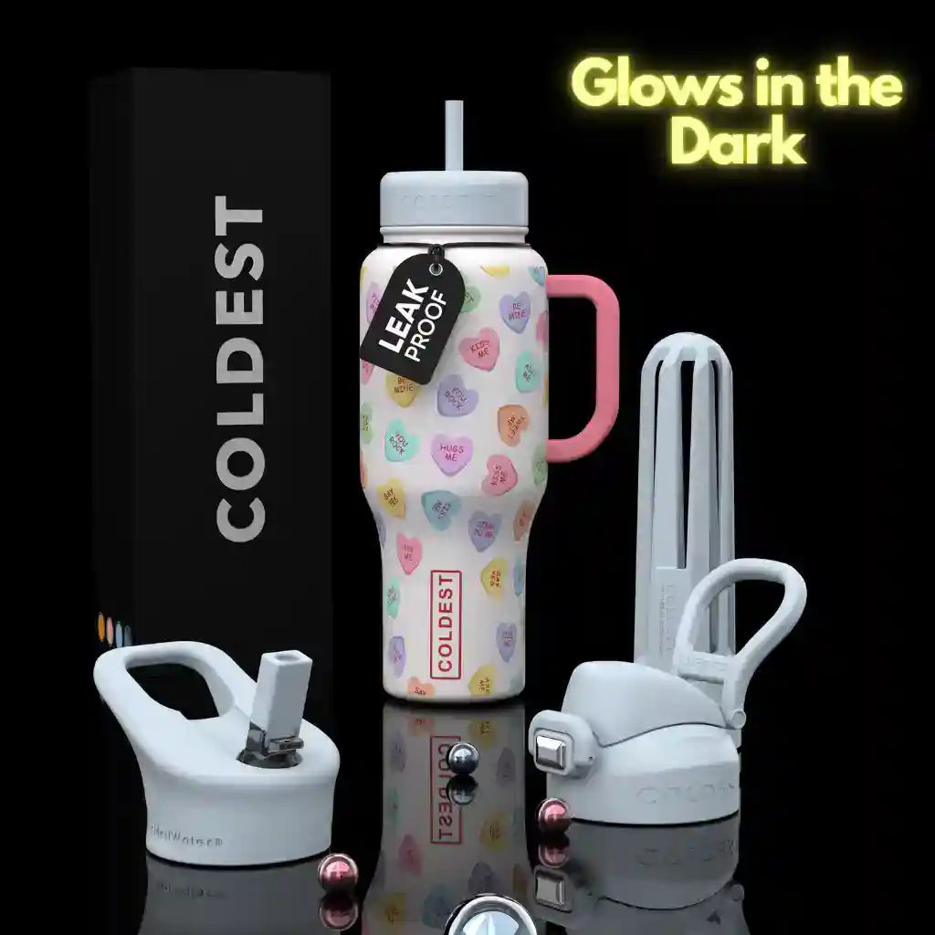 Colorful water bottle with accessories on a black background, featuring 'Coldest' branding.