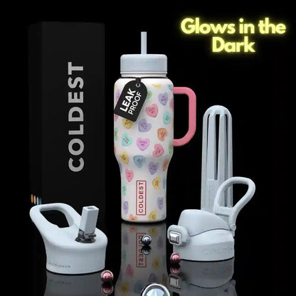 Colorful water bottle with accessories on a black background, featuring 'Coldest' branding.