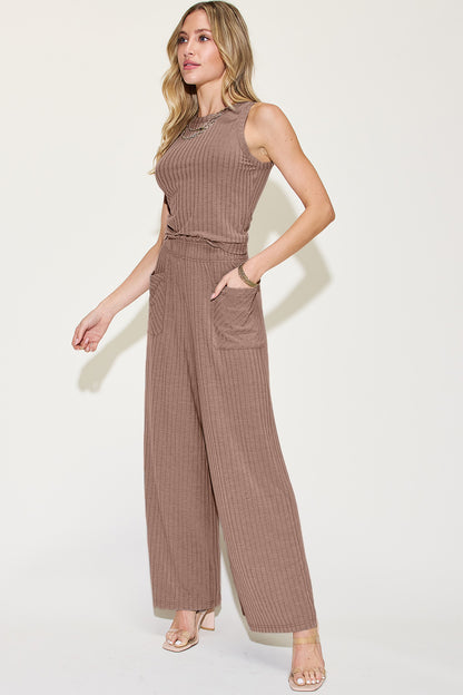 Full size ribbed tank top and wide leg pants set in a light brown color, featuring side pockets and a relaxed fit.