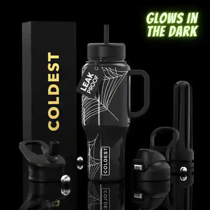 Black water bottle with spider web design, surrounded by accessories on a black background.