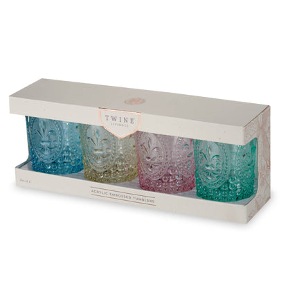Set of four embossed tumblers in blue, green, pink, and clear packaging with 'Twine' branding.