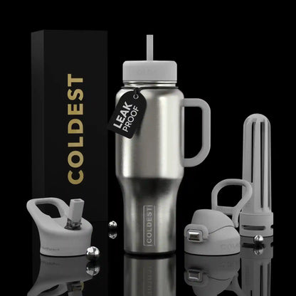 Silver insulated bottle with accessories on a black background, featuring the brand 'Coldest'.