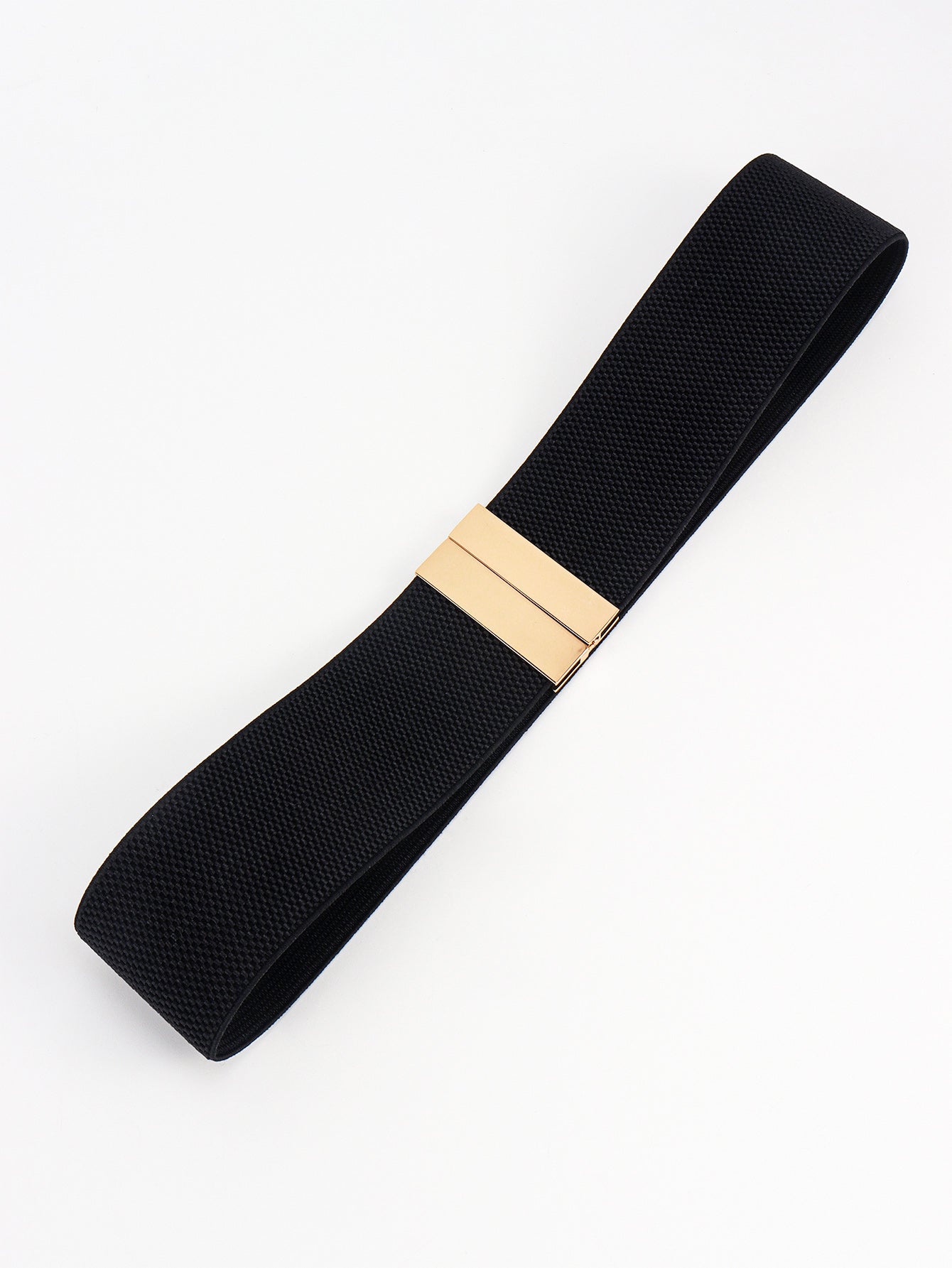 Black belt with a gold buckle on a white background