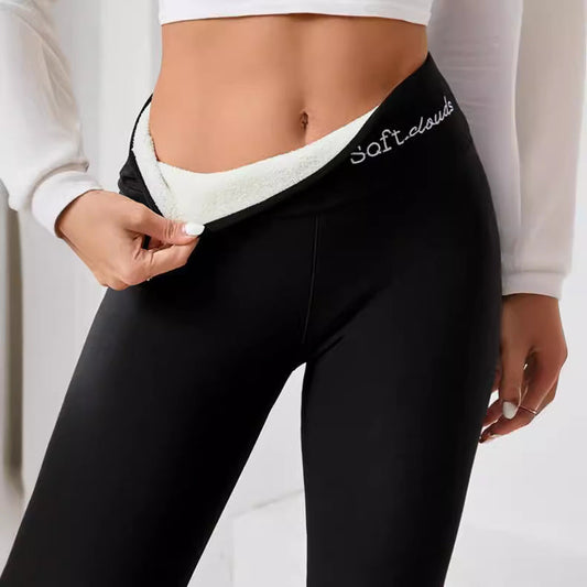 Black fabric leggings with white fleece lining and Soft clouds printed on the waistband.