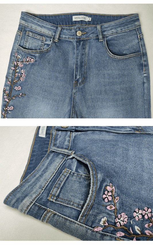 Light blue denim jeans shown in two views: a top-down view displaying the front pockets and waistband, and a folded view highlighting the floral embroidery on the pocket area.