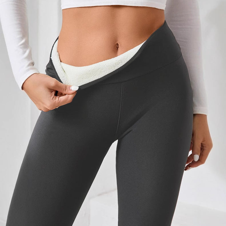 Dark gray fabric leggings with a thick white fleece lining visible at the waistband.