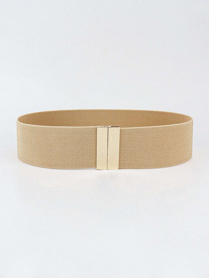 Beige belt with a gold buckle on a white background