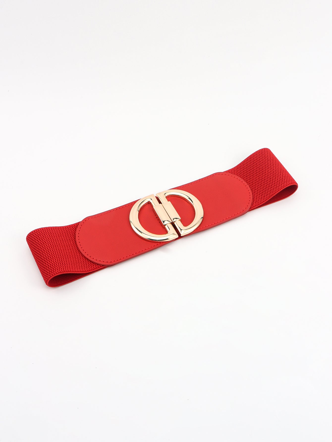 Red belt with a gold buckle on a white background