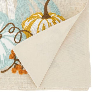 Decorative rug with pumpkin design on a white background