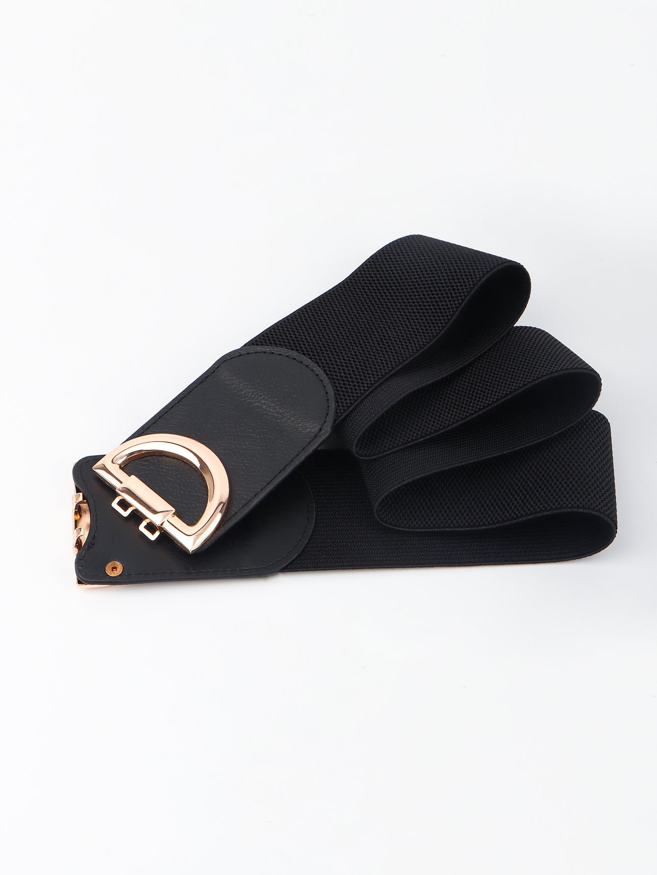 Black belt with a gold buckle on a white background